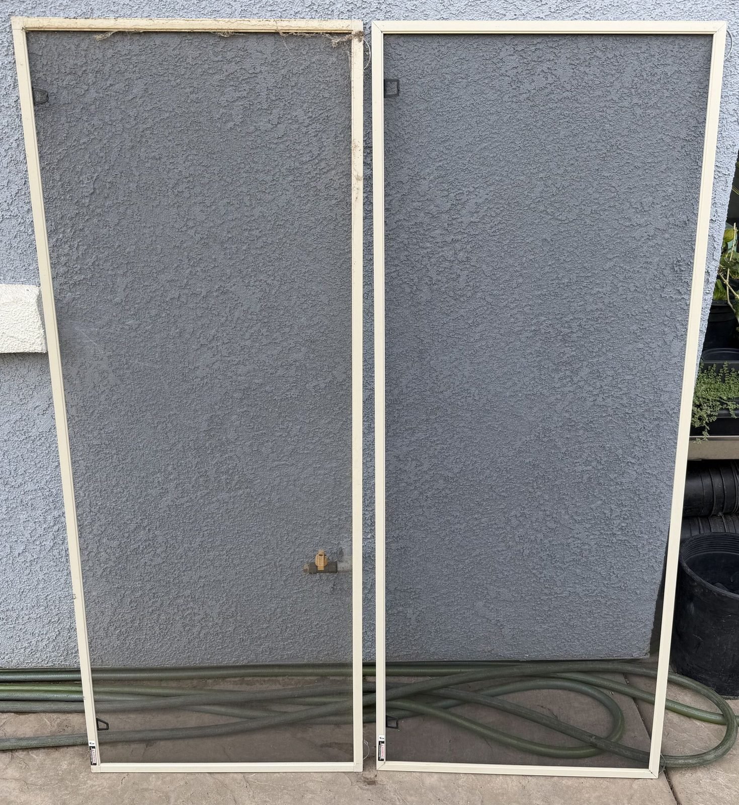 Window screens removed and set aside for on site cleaning